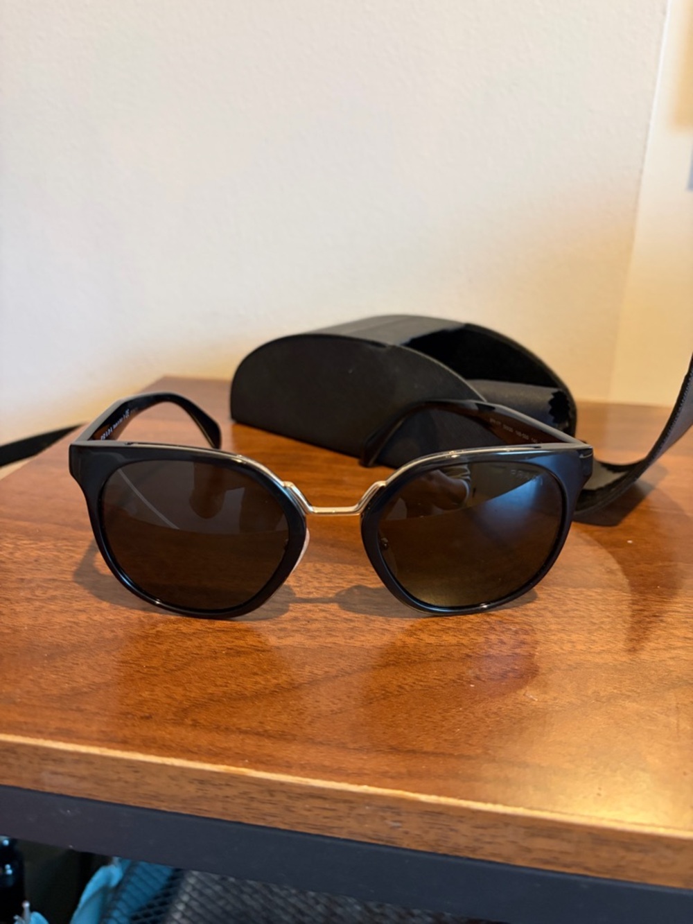 Prada Black Women’s Sunglasses with Silver Accents